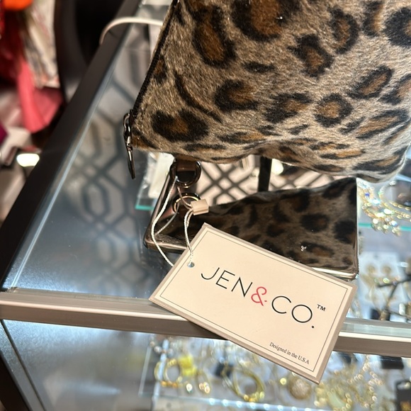 A Vegan animal print clutch with a shoulder strap - Picture 3 of 11